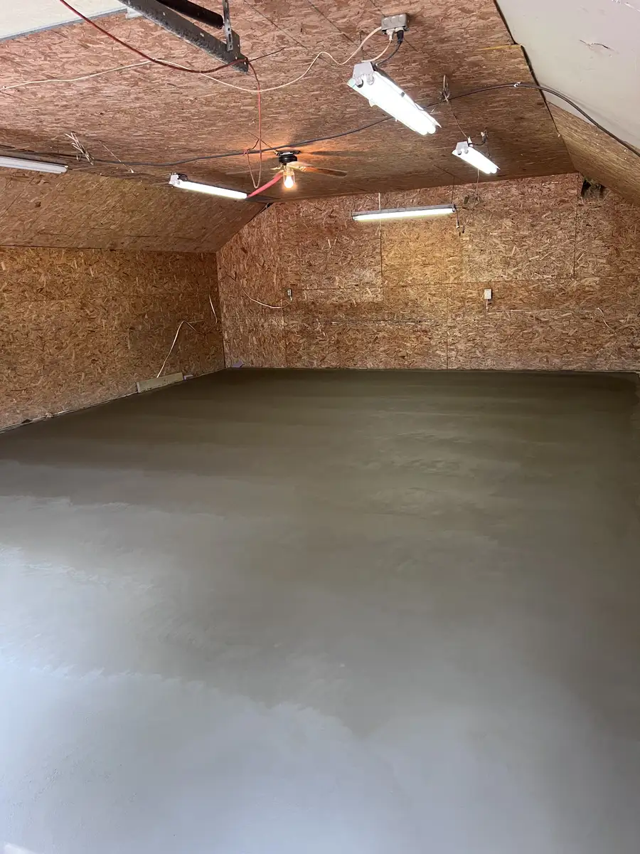 Smooth new concrete floor inside a shop building